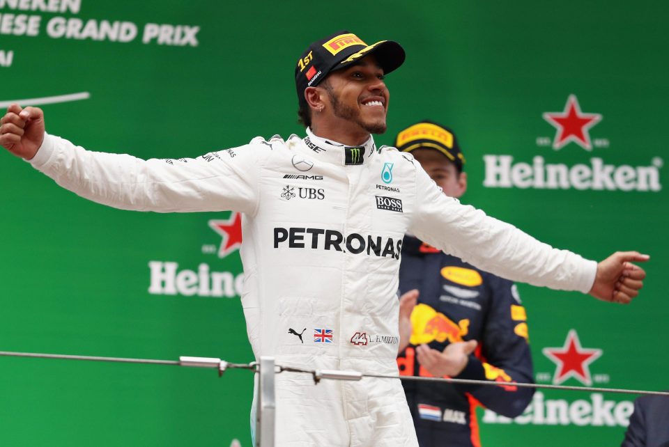  Lewis Hamilton celebrates after his first win of the 2017 season