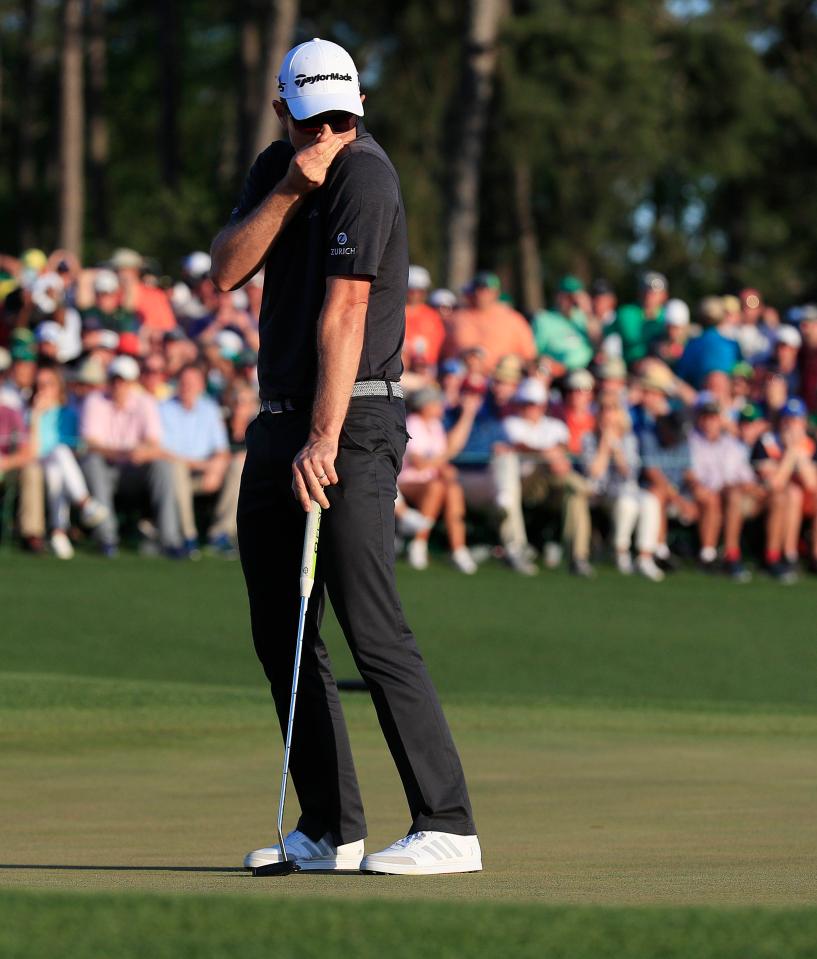  Justin Rose looks shocked as his birdie putt on the 18th in regulation just misses