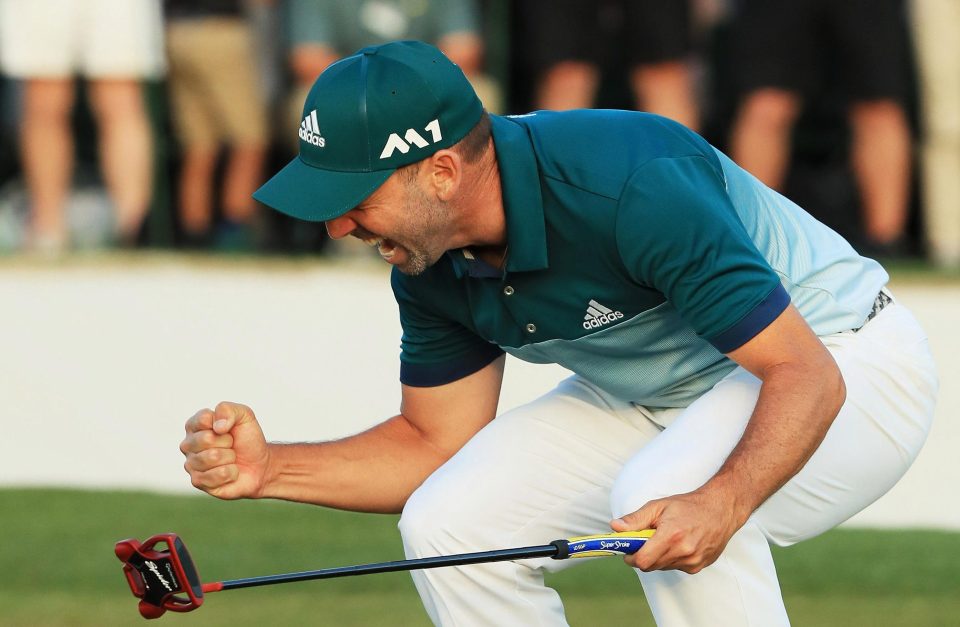  Sergio Garcia punches the air after sinking the putt that finally broke his Major duck