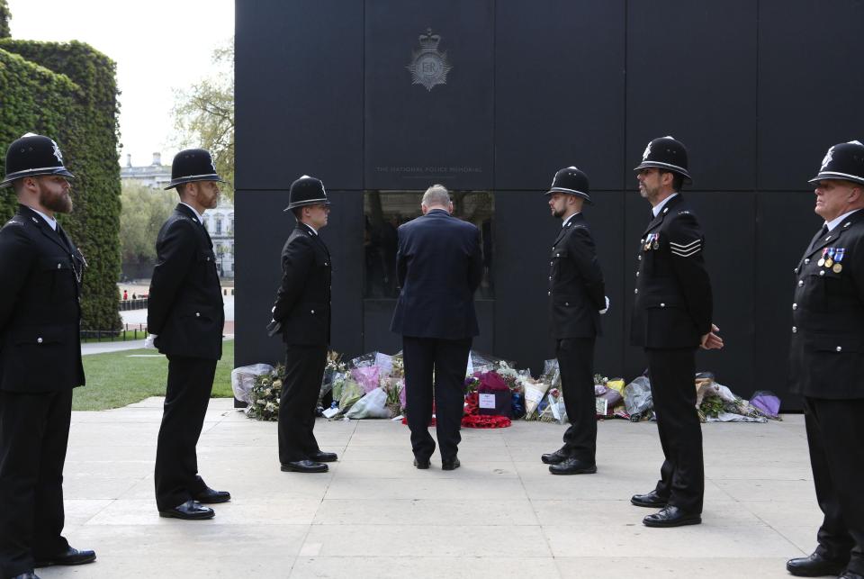 Police officers at the Police Roll of Honour Trust to add the names of fallen officers PC Keith Palmer and PC Gareth Browning 