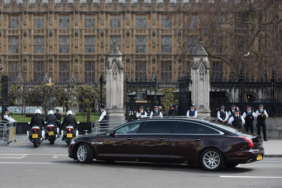 The funeral cortege for PC Palmer pictured outside the Houses of Parliament before moving him to Southwark