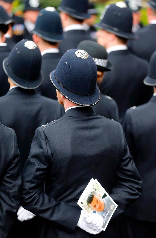 London paid silent tribute to the biggest-ever show of mourning for a cop killed in the line of duty