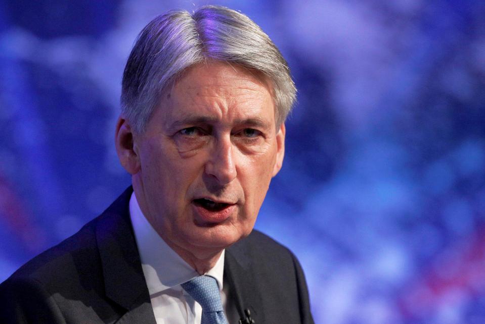  Chancellor Phillip Hammond says he works well with the PM