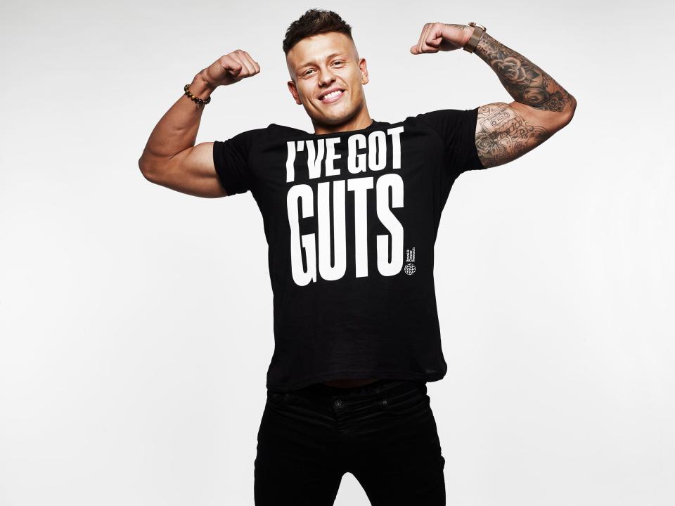  Alex Bowen flexes his muscles in one of the tops