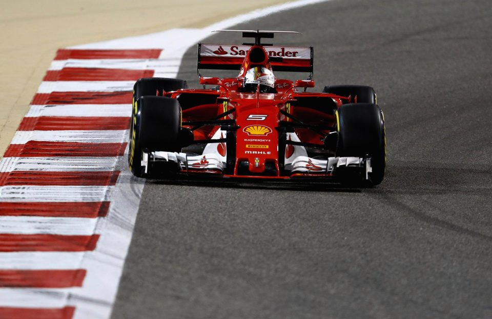  Sebastian Vettel crossed the finish line first despite coming under pressure from Lewis Hamilton