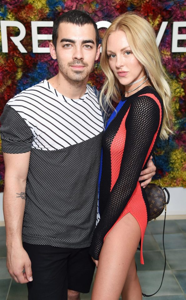  Joe Jonas and model Shea Marie looked effortlessly stylish at the Revolve event