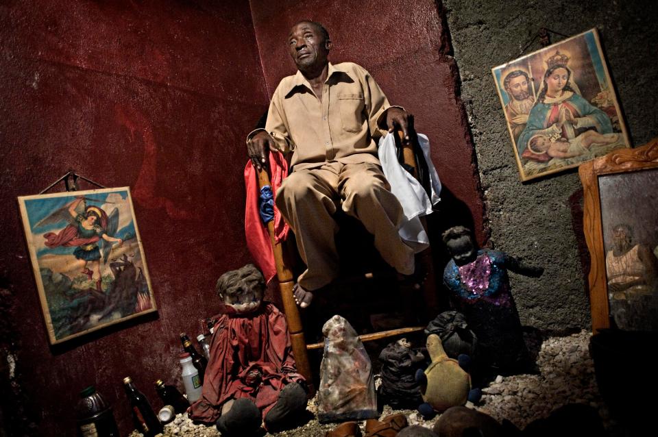  A Voodoo priest during an healing rite