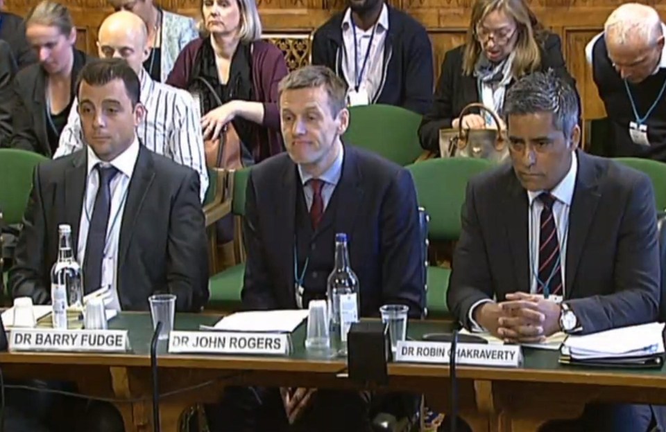 Dr Robin Chakraverty right) received a grilling from MPs for not registering what he gave Mo Farah 