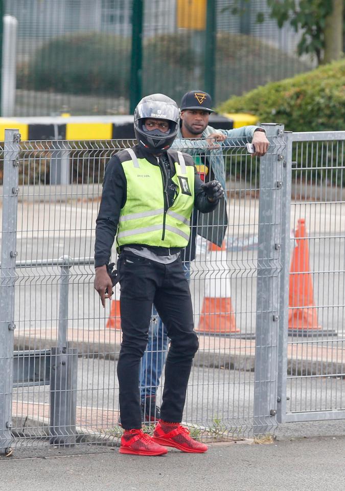 Germaine Mason spotted with Usain Bolt last year at a motorcycle session in England