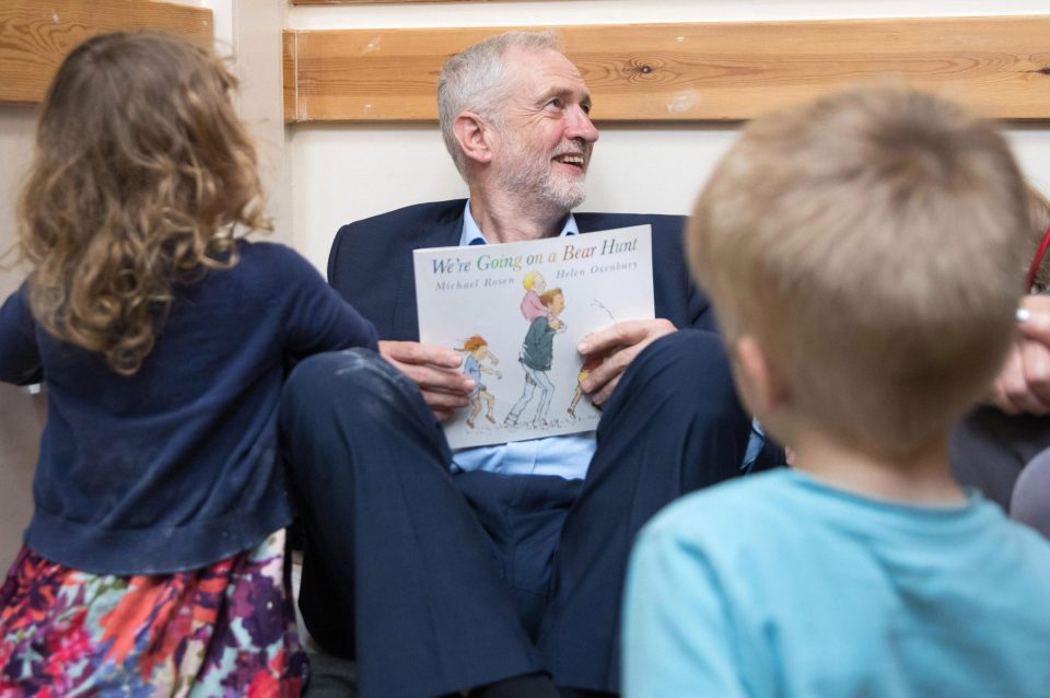  He got down into the kids' reading area to tell the story