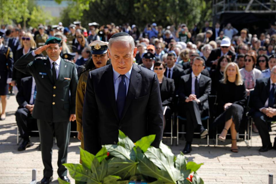  Israeli Prime Minister Benjamin Netanyahu lays a wreath at the Yad Vashem Holocaust memorial in Jerusalem