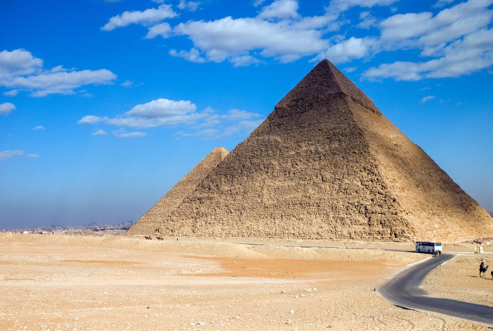  The pyramids are often seen rising from bare, undistrubed stretches of sand