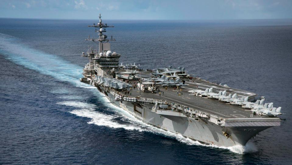 USS Carl Vinson is 333m long and can carry more than 6,000 crew members