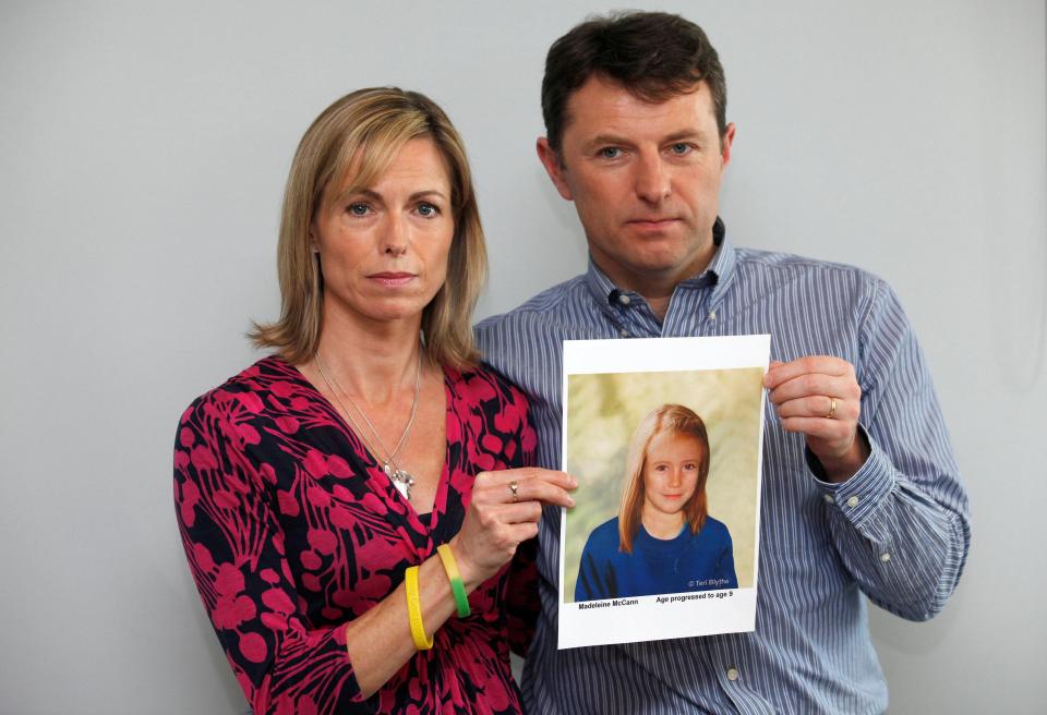 Kate and Gerry McCann with a picture of their daughter