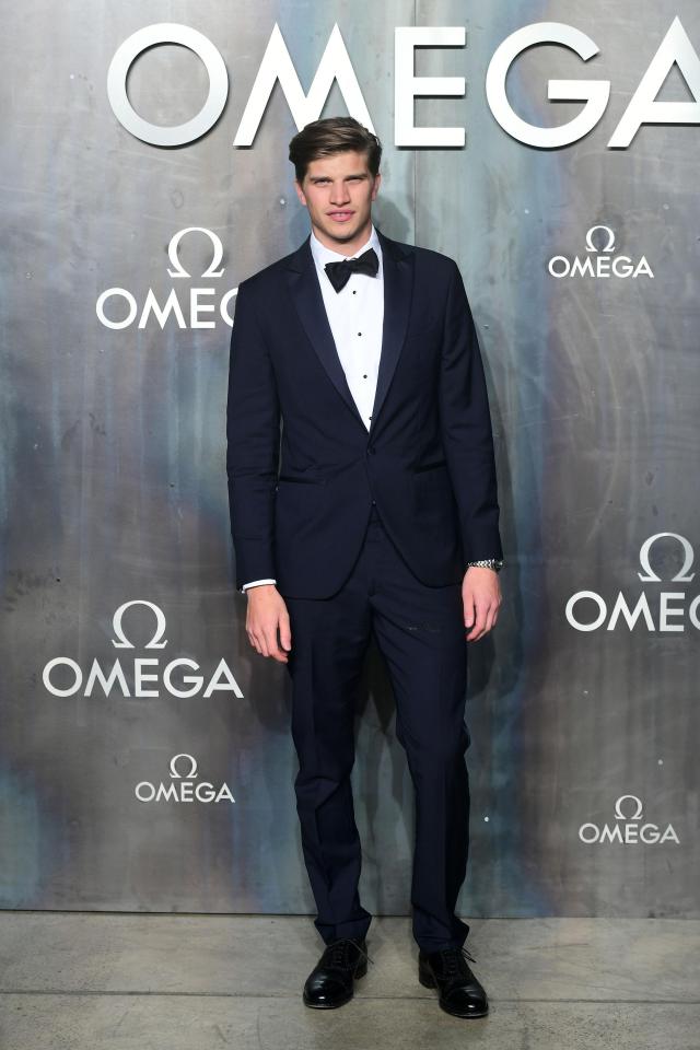  Dapper model Toby Huntington Whiteley gave off a James Bond vibe in his black suit complete with bow tie