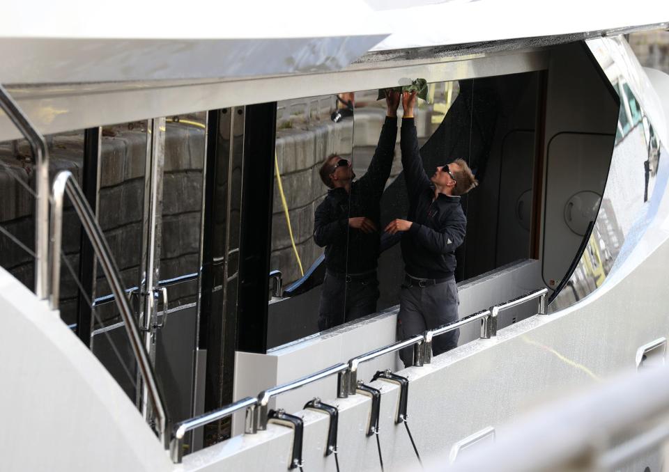  A member of staff performs his duties on board the ship that can sleep 12