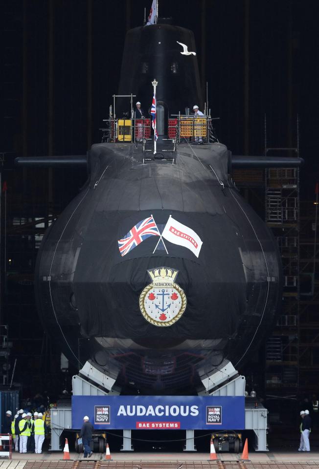  The imposing nuclear sub HMS Audacious makes its first journey out of the Devonshire Dock Hall in Barrow-in-Furness, Cumbria