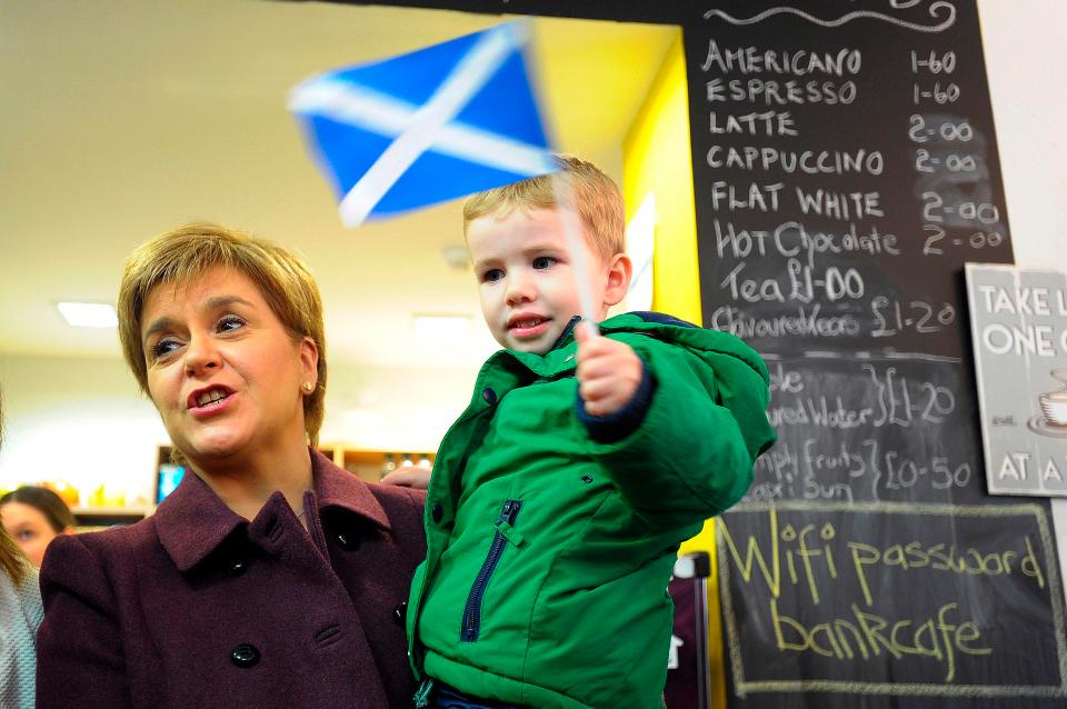  Battlegrounds . . . Nicola Sturgeon pictured with young Scot