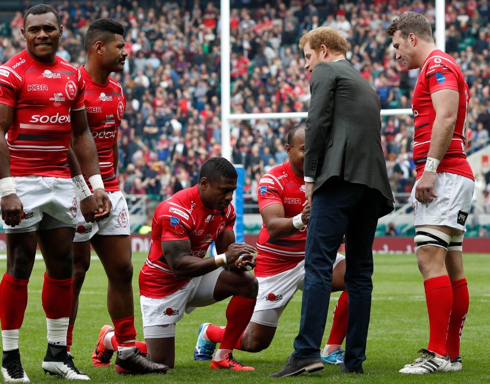  Two Fijians bowed to Prince Harry on the field