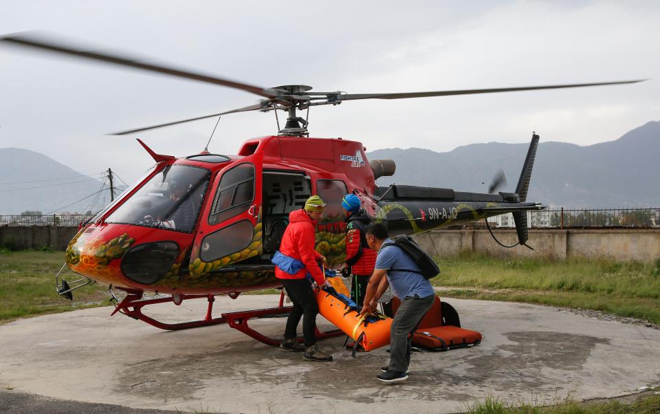  The dead body of Swiss climber Ueli Steck arrives at Helipad of Teaching Hospital in Kathmand this morning