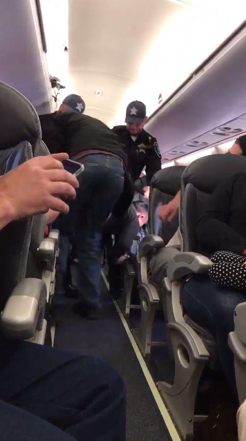  As he was pulled from his seat, his face slammed against an arm rest