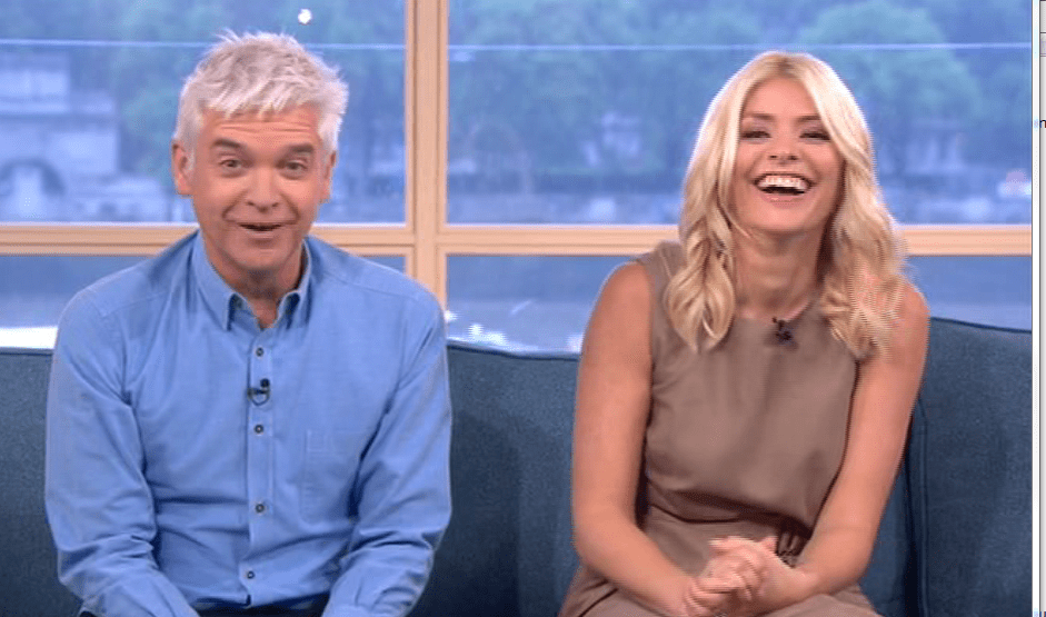  Holly wore a belted tan dress on This Morning earlier today