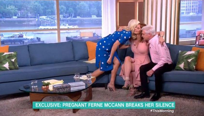  Holly and Phil gave their guest a big hug