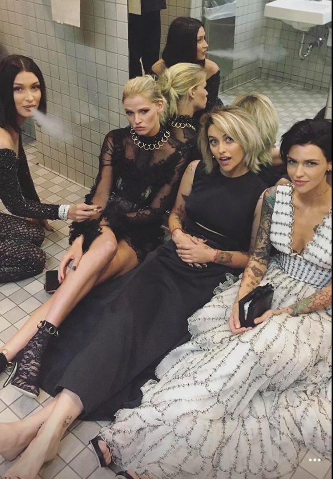  Bella Hadid joined Lara Stone, Paris Jackson and Ruby Rose chilling on the bathroom floor as they smoke