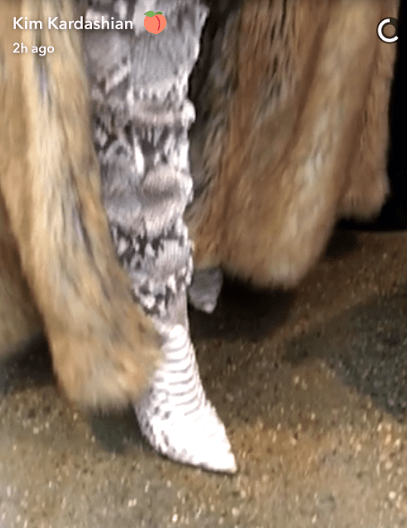 Kim also wore these impressive over-the-knee snake skin boots