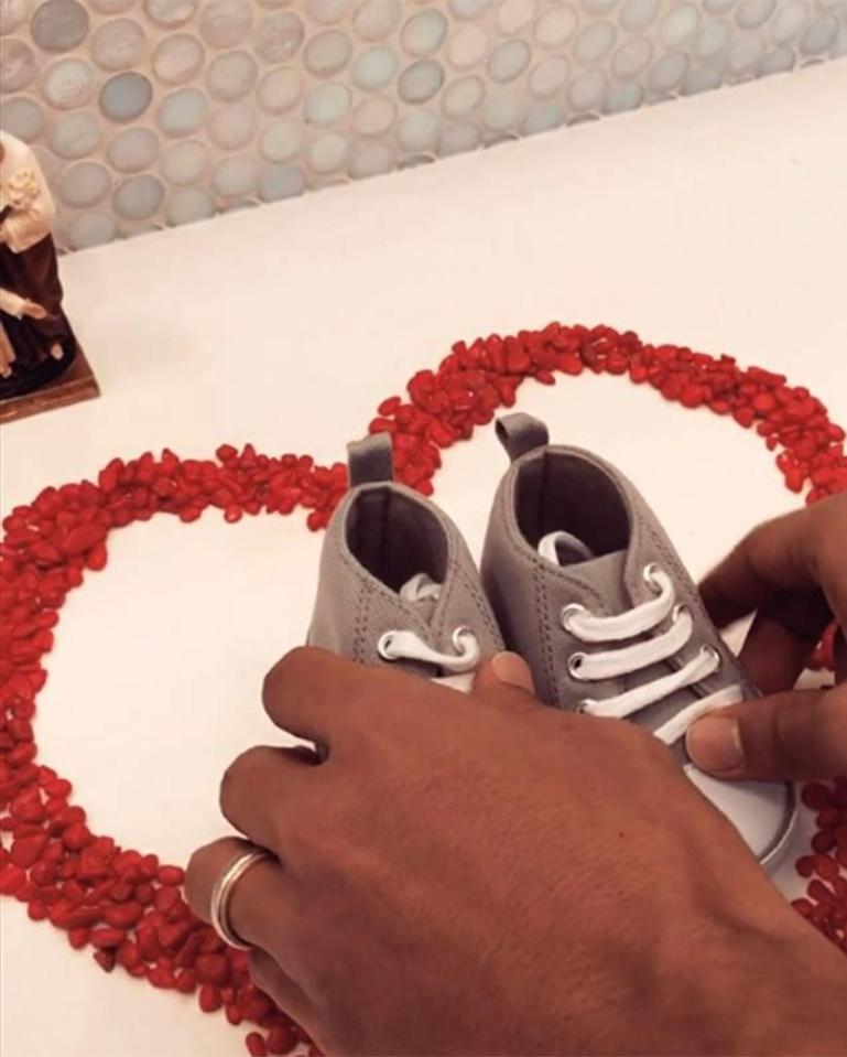  Carol Cabrino laid out a heart and some kids' shoes in the room