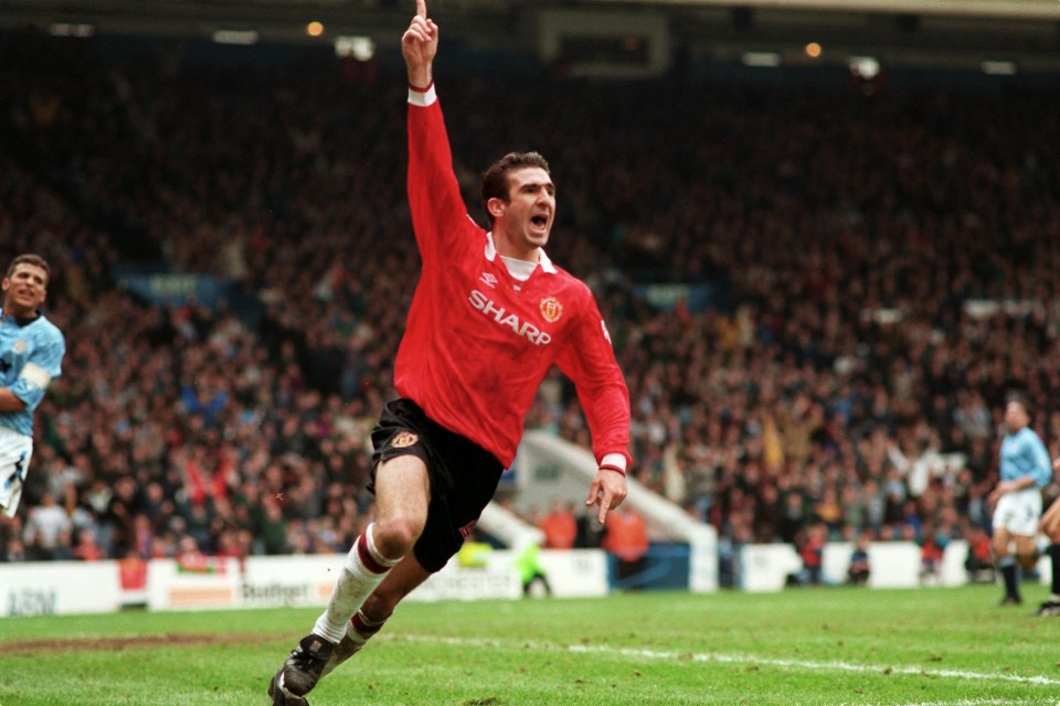 Eric Cantona celebrates a goal for Manchester United in derby at Maine Road