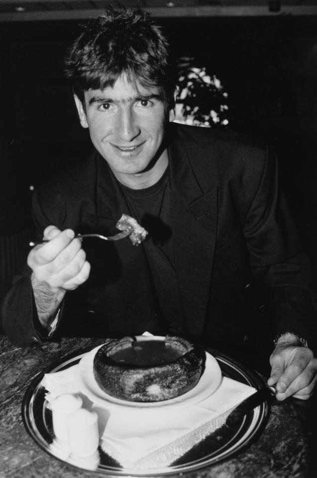 Eric Cantona tucks into a Yorkshire pudding while playing at Leeds in 1992