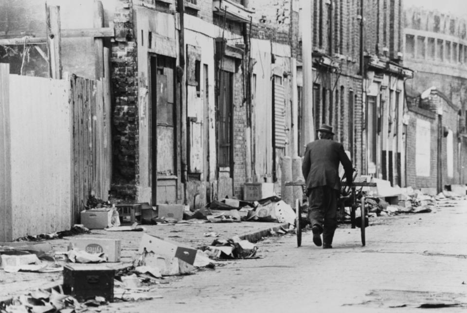  Deserted streets littered with rubbish in London's East End in the 70s