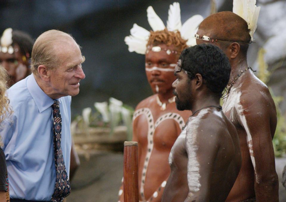  The Duke of Edinburgh pictured talking with Aboriginal men in Queensland, Australia