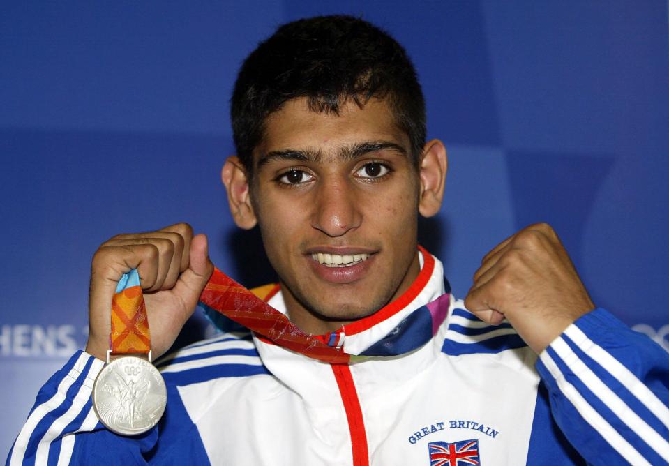  Amir Khan poses with his silver medal after finishing second in Athens in 2004