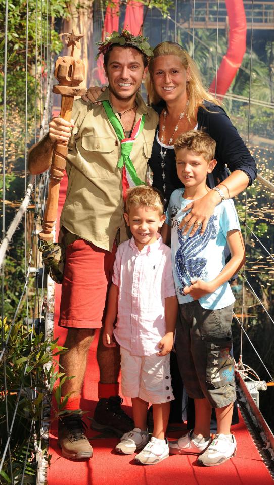  Gino, who won I'm A Celeb in 2009, with his wife Jessica and two sons, Luciano, far right, and Rocco