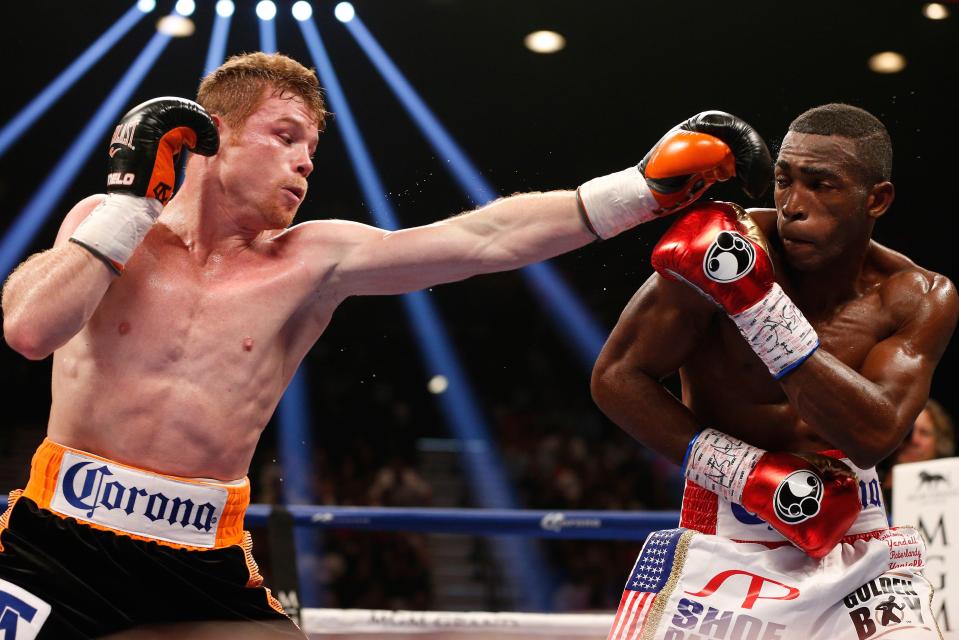  Saul 'Canelo' Alvarez jabs at Erislandy Lara in a bout in Las Vegas in 2014