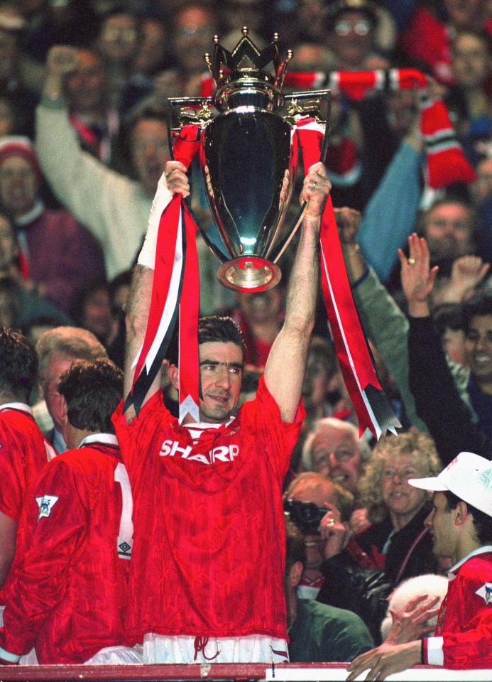 Eric Cantona lifts the Premier League trophy with Manchester United in 1993