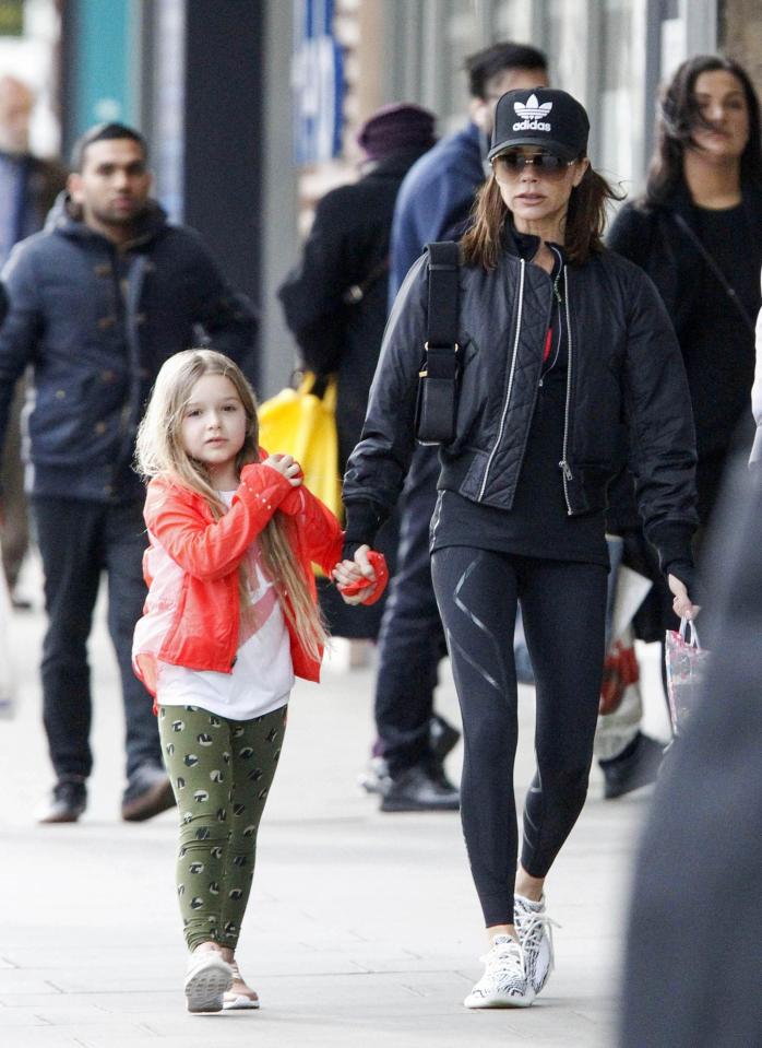  Following mum's footsteps... Victoria Beckham with daughter Harper, 5