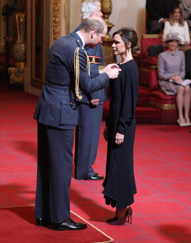  Victoria Beckham recently accepted an OBE Award from Prince William