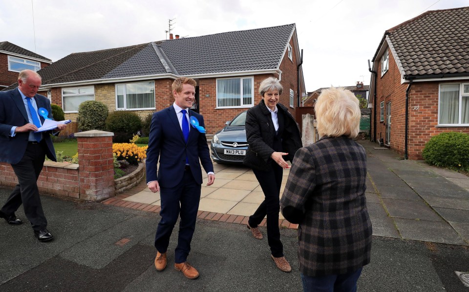 Theresa May meets a resident on the streets of Ormskirk, West Lancashire