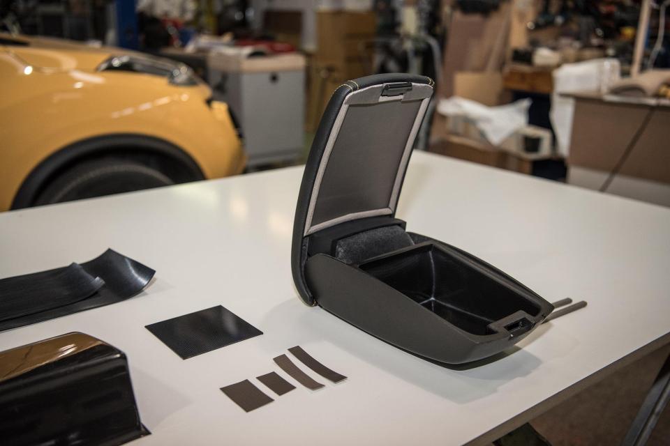 The compartment is embedded in the armrest of the Nissan Juke crossover