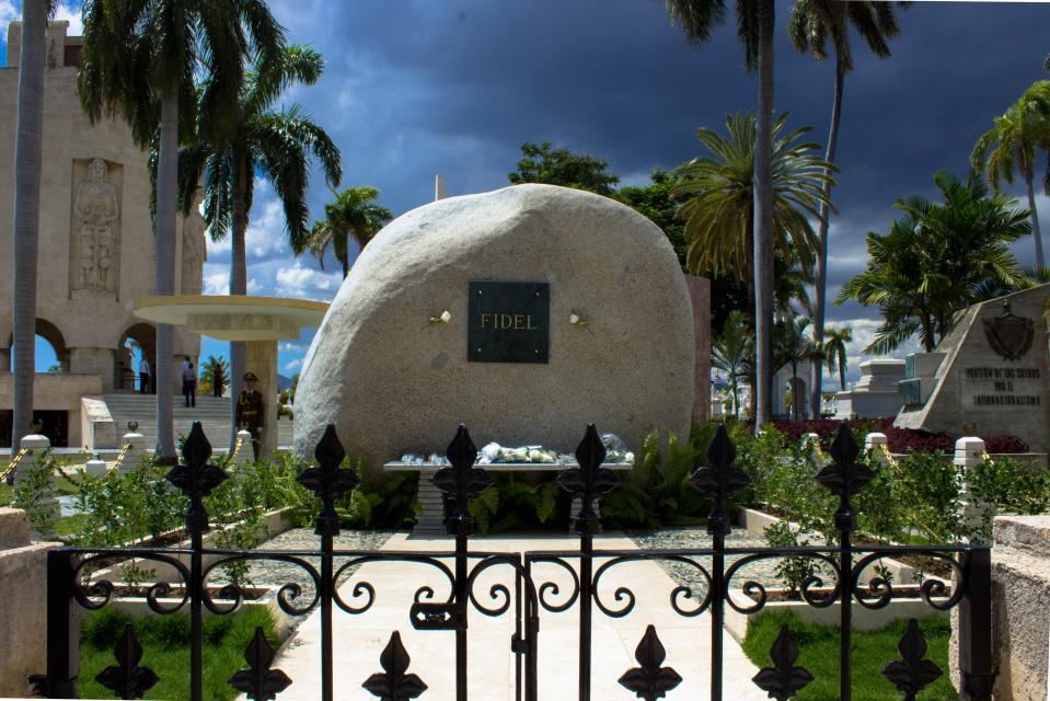  Castro's grave... a boulder marked only with his first name, Fidel, sits in the Santa Ifigenia Cemetery