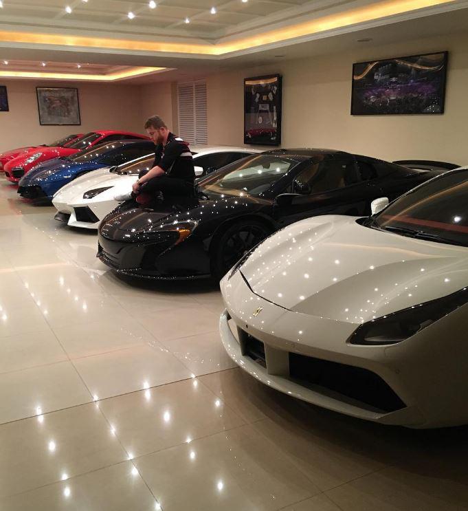  Saul 'Canelo' Alvarez poses with his six supercars to show how far he has come from his humble roots