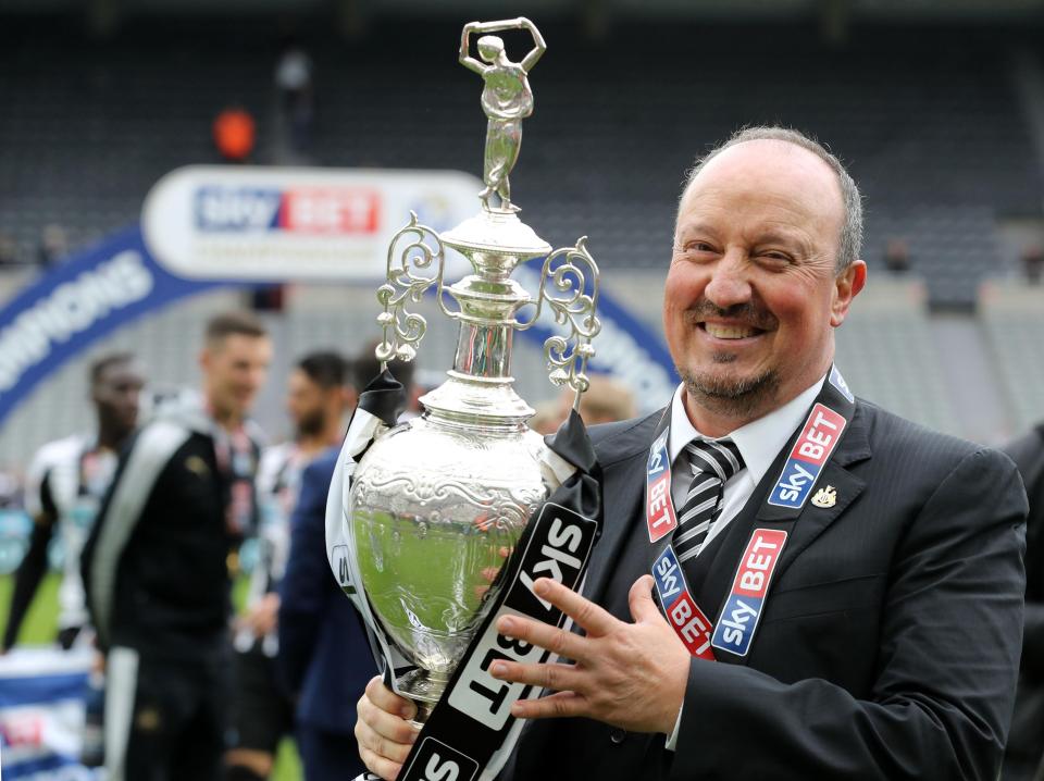 Rafa Benitez lifted the Championship trophy and set his sights on more silverware