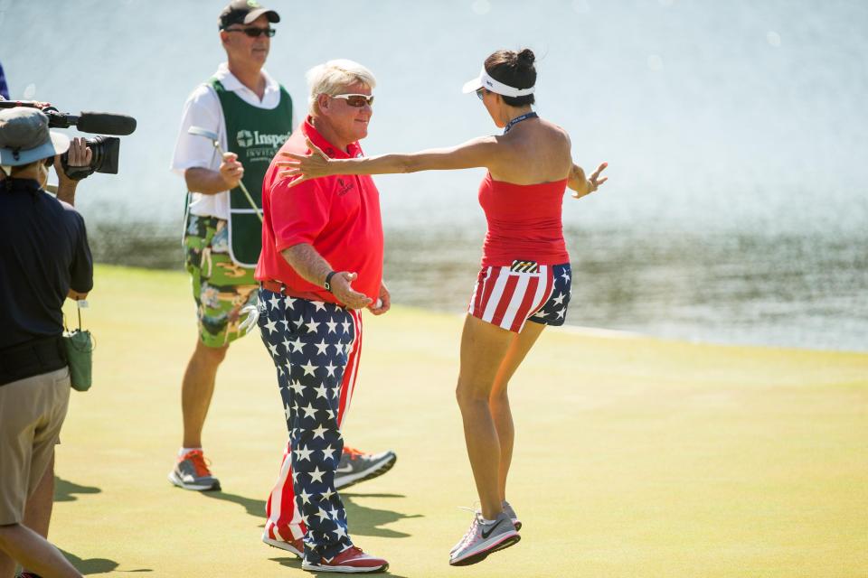  John Daly is greeted at the eighteenth green by girlfriend Anna Cladakis