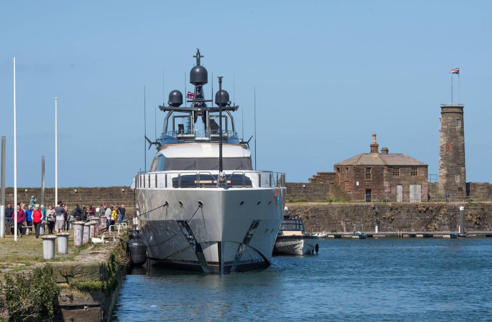  The enormous vessel is adorned with a cat-like sculpture on its prow and attracted a crowd in Whitehaven