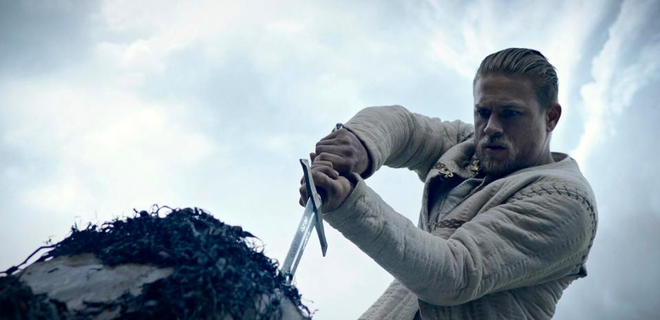  King Arthur pulls his sword Excalibur from the stone in the timeless scene