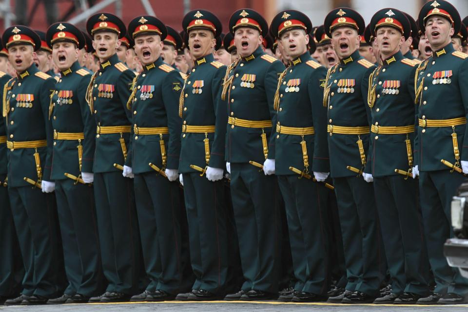  A group of Russian servicemen stand to attention