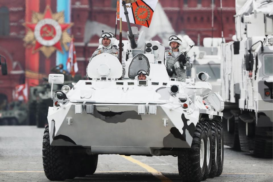  Among the military vehicles to roll through Red Square were camouflaged tanks designed for fighting in snowy conditions